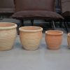 29 set van 4 ronde terracotta bloempotten €29.50 budget hal54